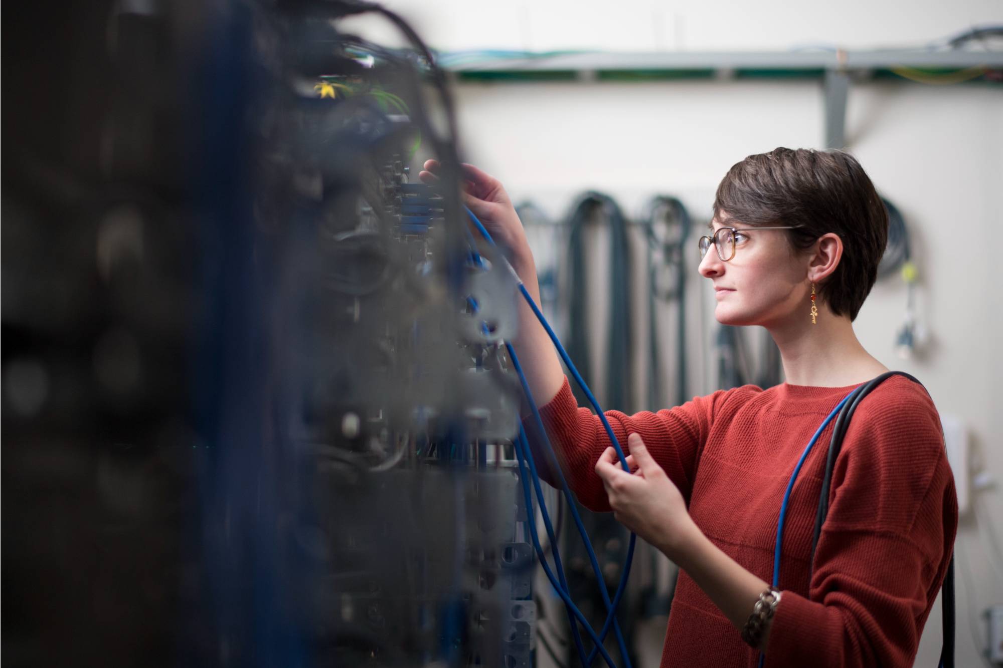 Information technology student Annelise Trout works in the server lab in Mackinac Hall on Grand Valley&#8217;s Allendale Campus.